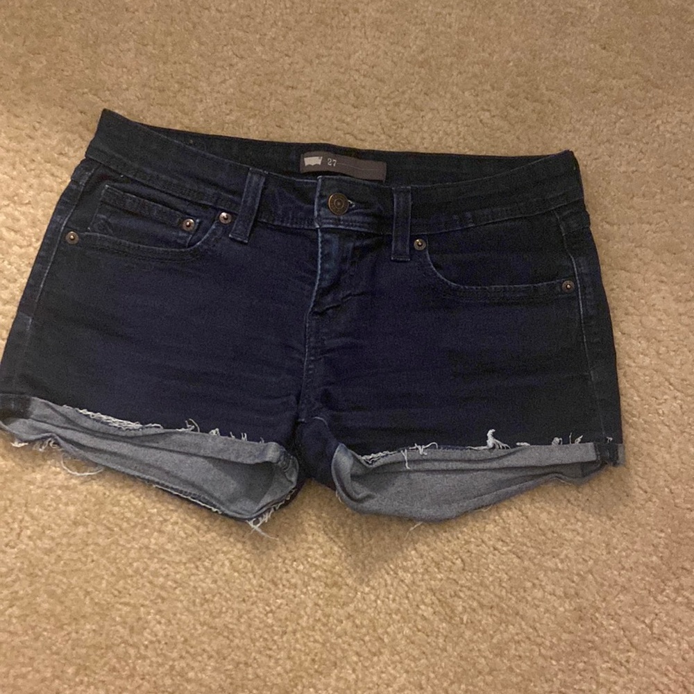 Levi’s low rise dark blue denim shorts
